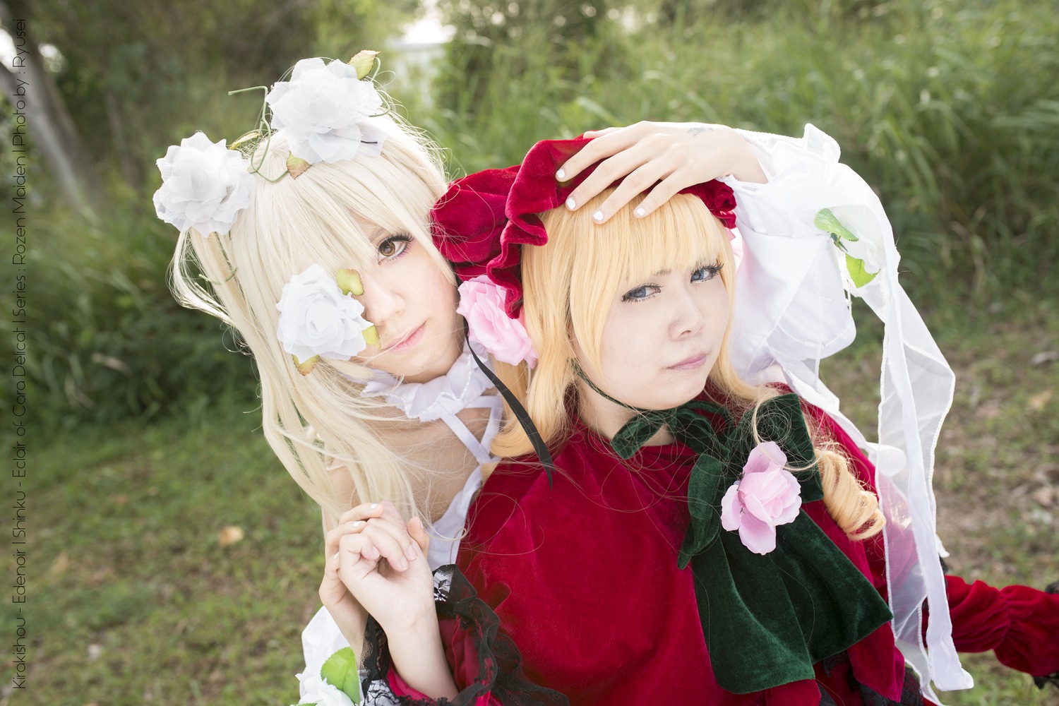 2girls bangs blonde_hair blue_eyes choker dress eyepatch flower hair_ornament lips long_hair multiple_cosplay multiple_girls nature rose tagme upper_body