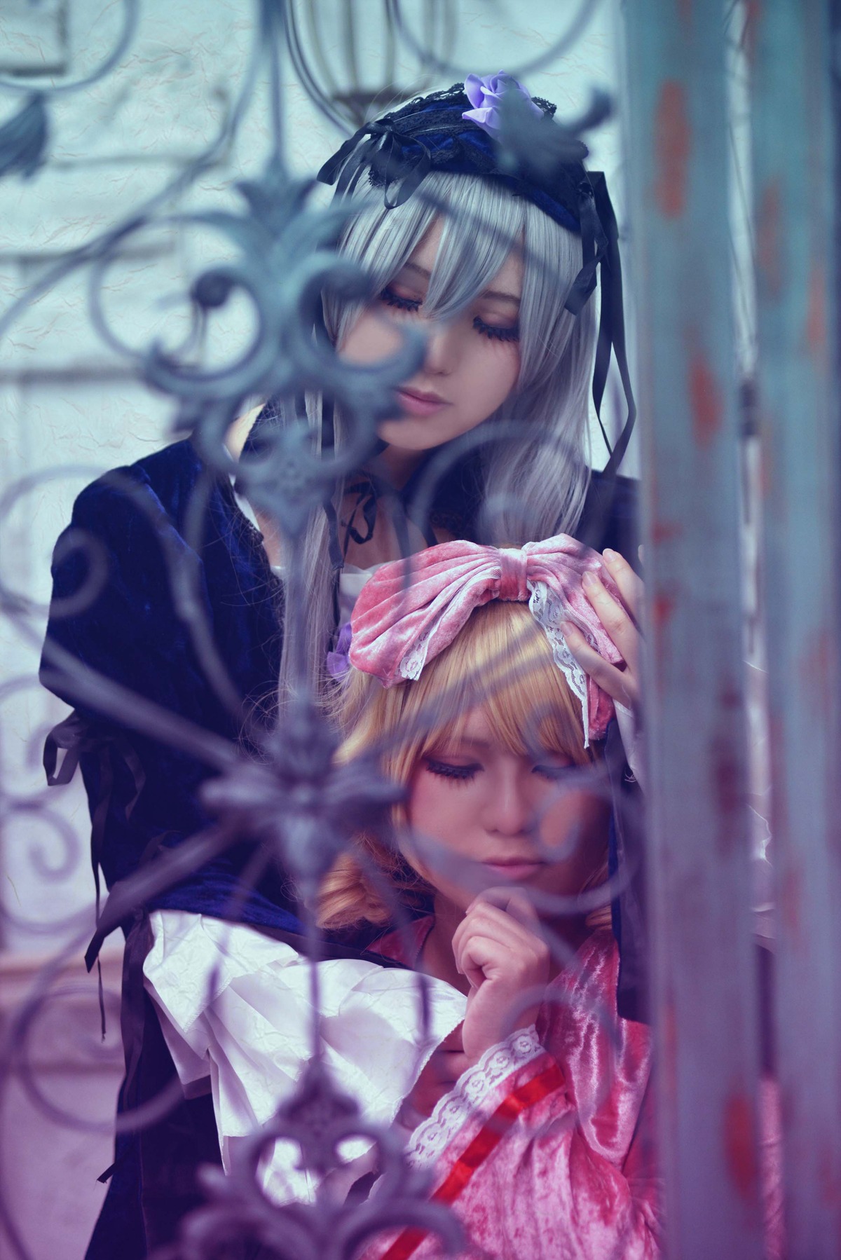2girls bangs blonde_hair blurry blurry_background blurry_foreground closed_eyes closed_mouth depth_of_field long_hair multiple_cosplay multiple_girls ribbon sleeping tagme