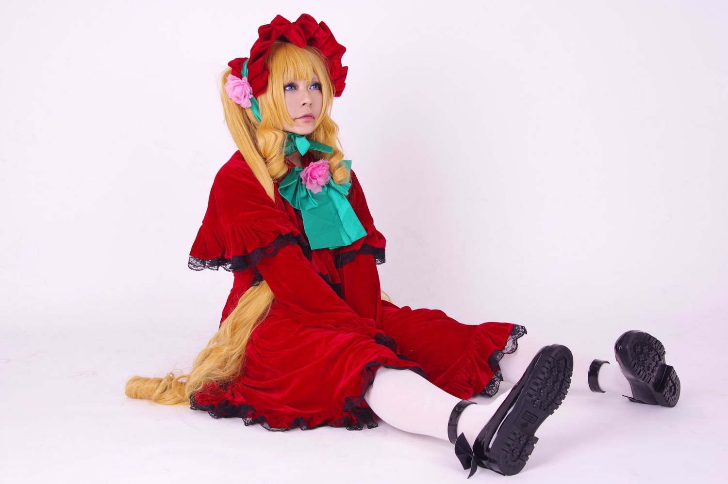 1girl black_footwear blonde_hair blue_eyes bonnet boots capelet dress flower full_body long_hair pantyhose red_capelet red_dress rose shinku shoes shoes_removed sitting solo twintails v_arms