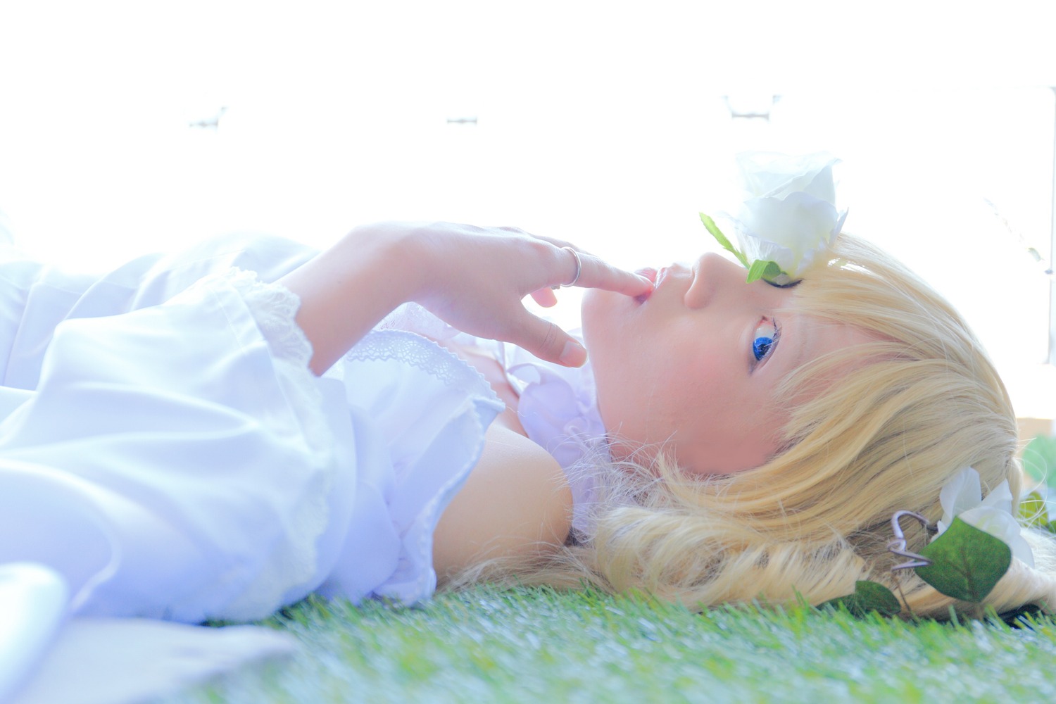 1girl blonde_hair blue_eyes bug butterfly crown grass insect kirakishou lips lying solo striped vertical_stripes