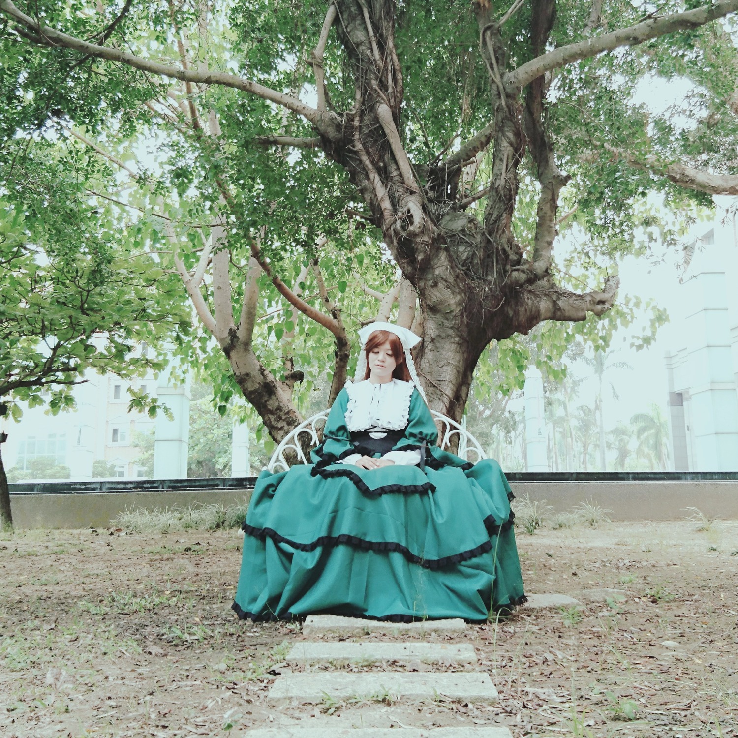 1girl blue_dress brown_hair closed_eyes day dress long_hair outdoors sitting solo suiseiseki tree