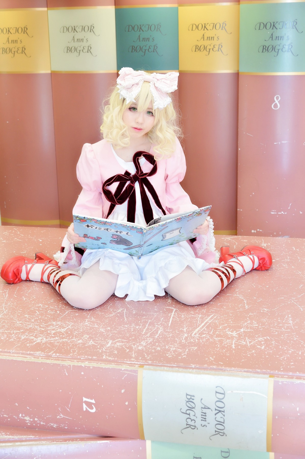 1girl blonde_hair dress hinaichigo lips red_footwear ribbon shoes sitting solo striped wariza