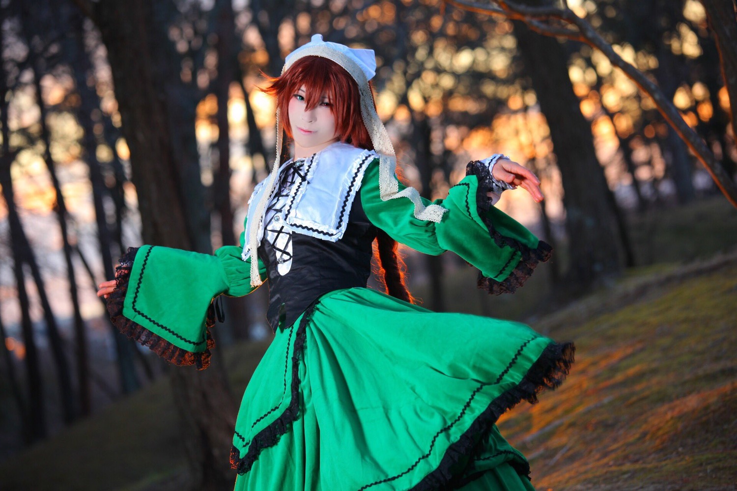 1girl blue_dress blurry blurry_background brown_hair depth_of_field dress frills green_dress long_sleeves looking_at_viewer outdoors ribbon short_hair smile solo suiseiseki