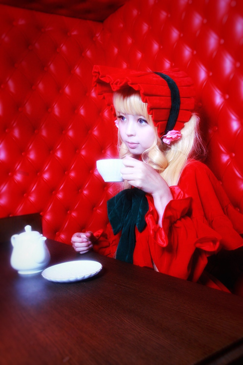 1girl bangs blonde_hair blue_eyes cup dress flower food fruit shinku sitting solo teacup