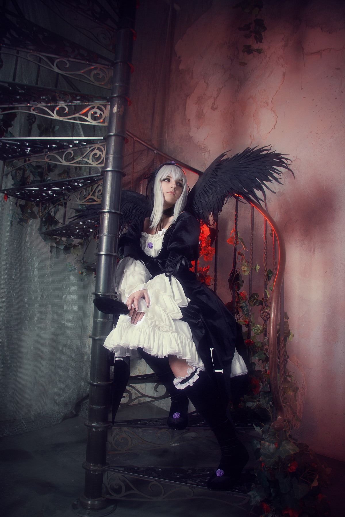 1girl black_wings dress feathers frills hairband long_hair silver_hair sitting solo suigintou wings