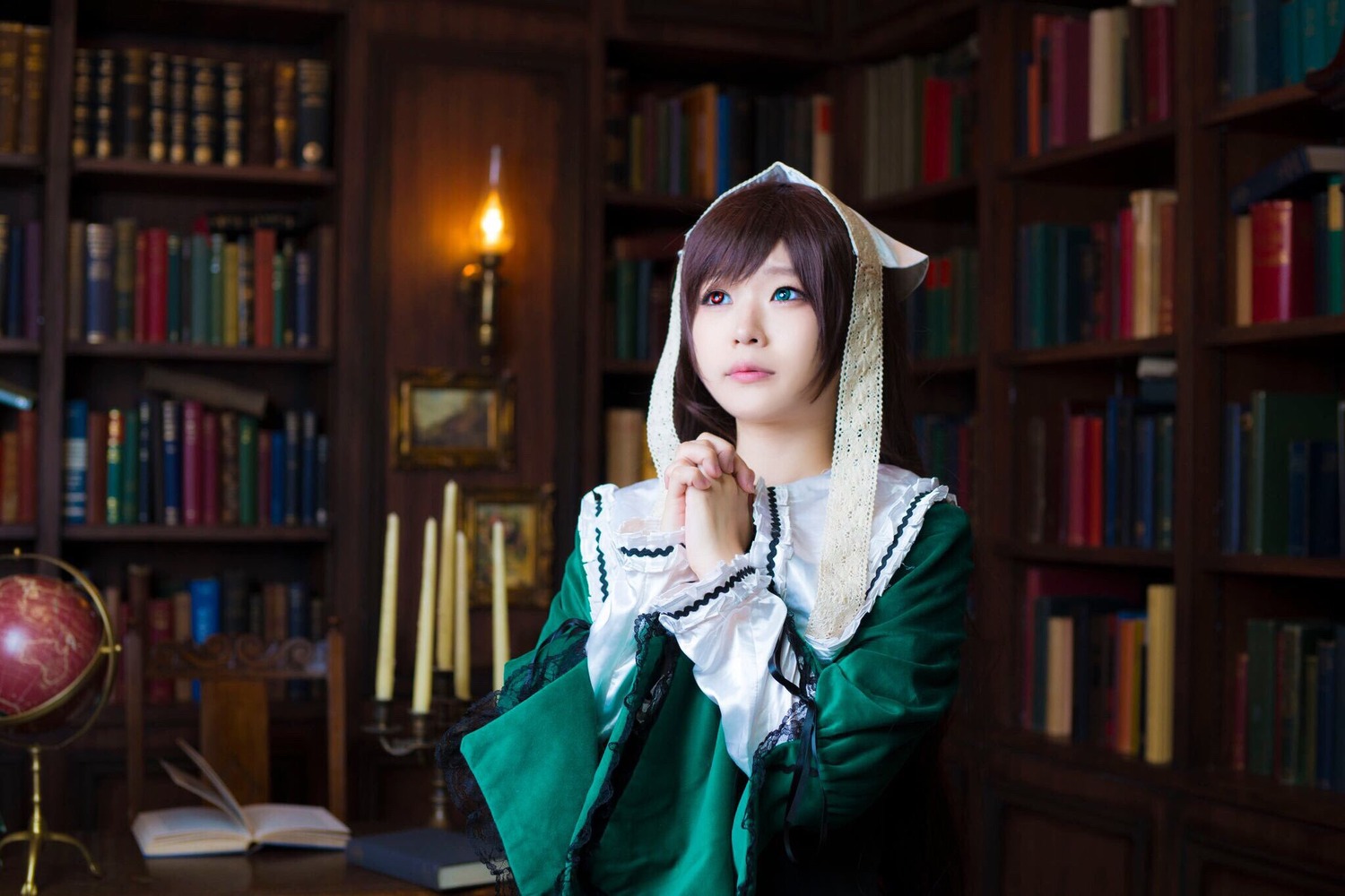 1girl blue_eyes blurry book book_stack bookshelf brown_hair depth_of_field indoors library lips long_hair looking_at_viewer open_book solo suiseiseki