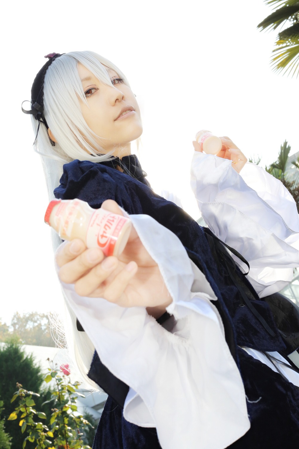 1boy blurry depth_of_field giving holding holding_food long_sleeves solo striped suigintou tree white_hair