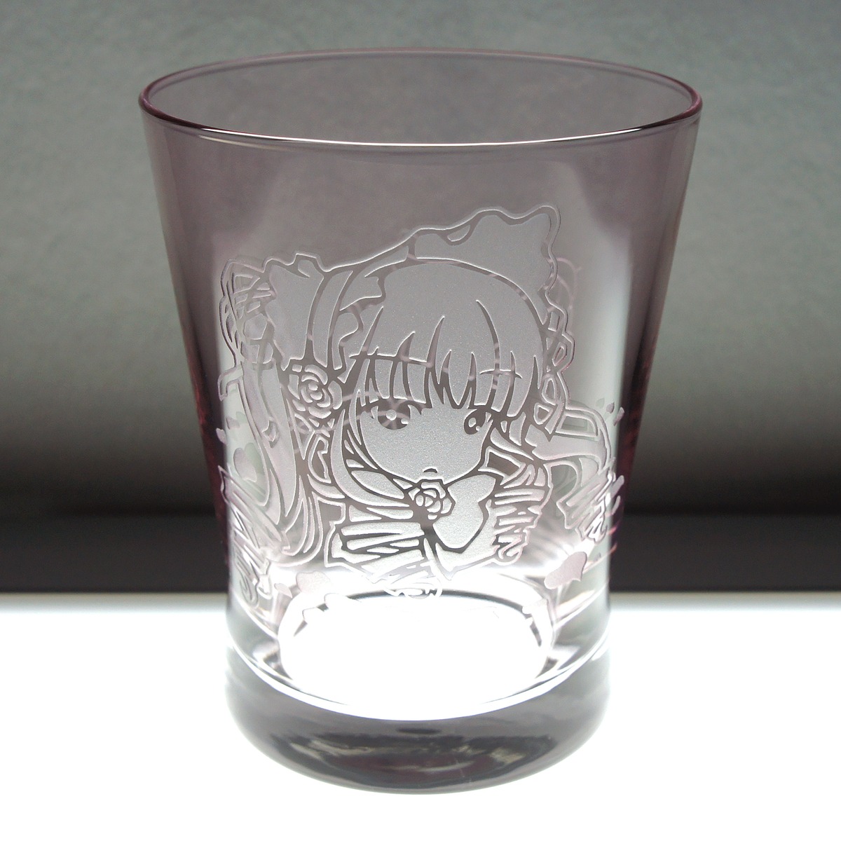 1girl bangs bonnet cup eyebrows_visible_through_hair greyscale image in_container long_hair looking_at_viewer monochrome rose shinku solo teacup