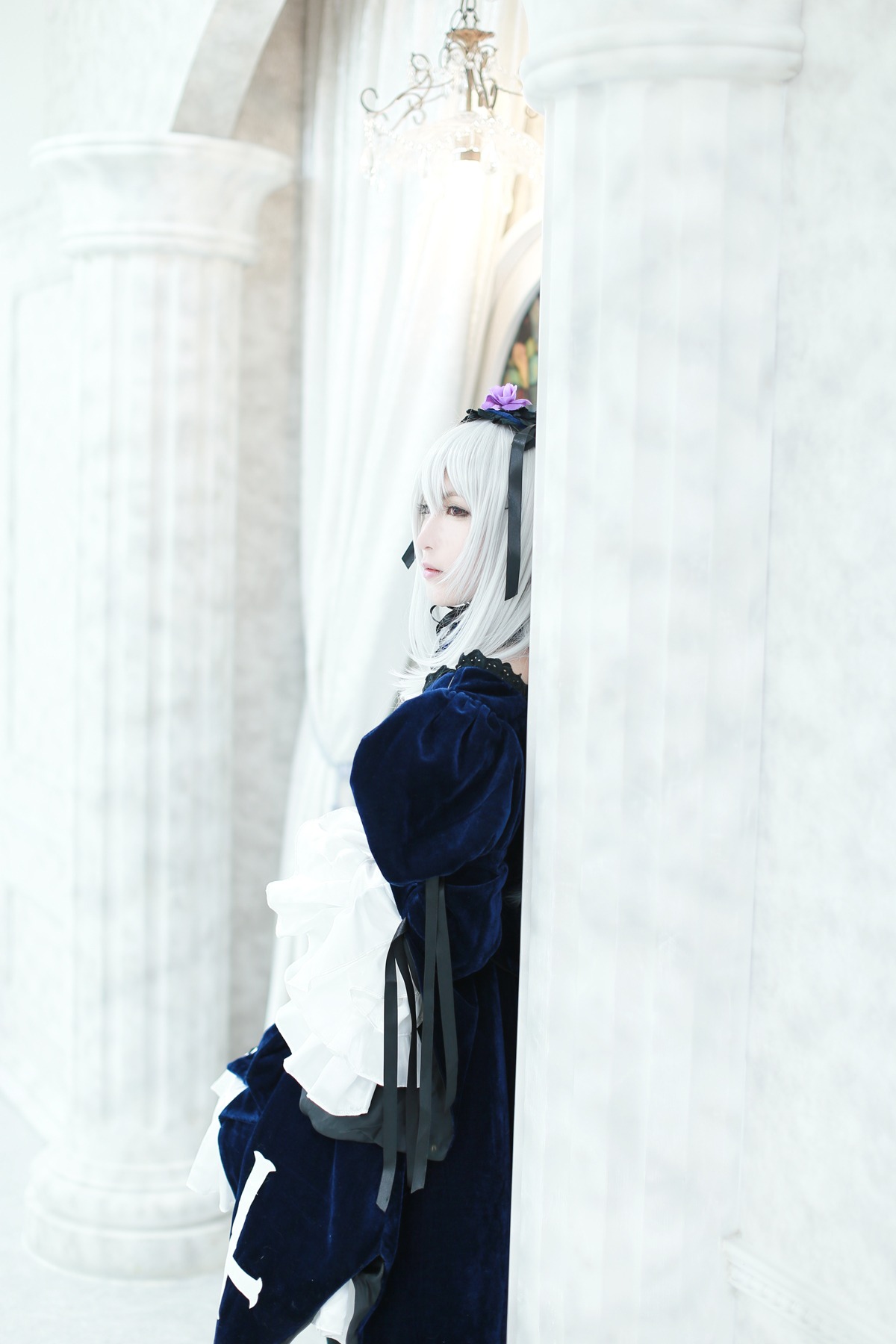 1girl blurry curtains depth_of_field dress frills indoors long_sleeves looking_at_viewer solo suigintou white_hair