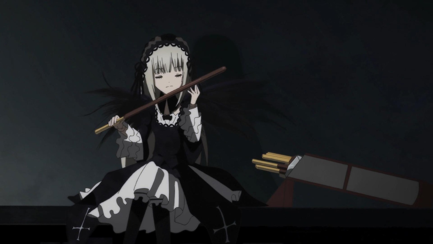1girl black_dress black_legwear boots closed_mouth cross dress frills hairband holding holding_weapon image long_sleeves looking_at_viewer sitting solo suigintou weapon
