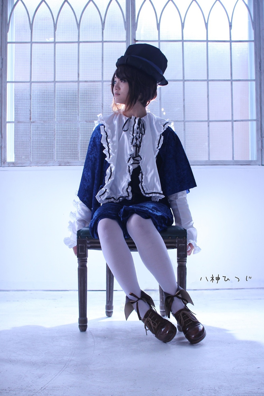 1girl black_hair hat long_sleeves shoes short_hair sitting skirt solo souseiseki