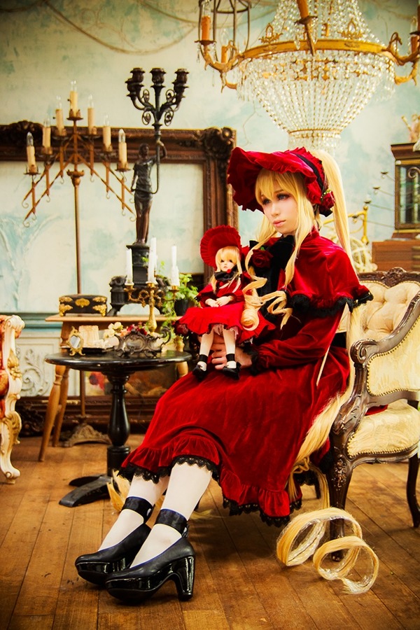 1girl blonde_hair blue_eyes bonnet dress indoors red_dress shinku sitting solo table