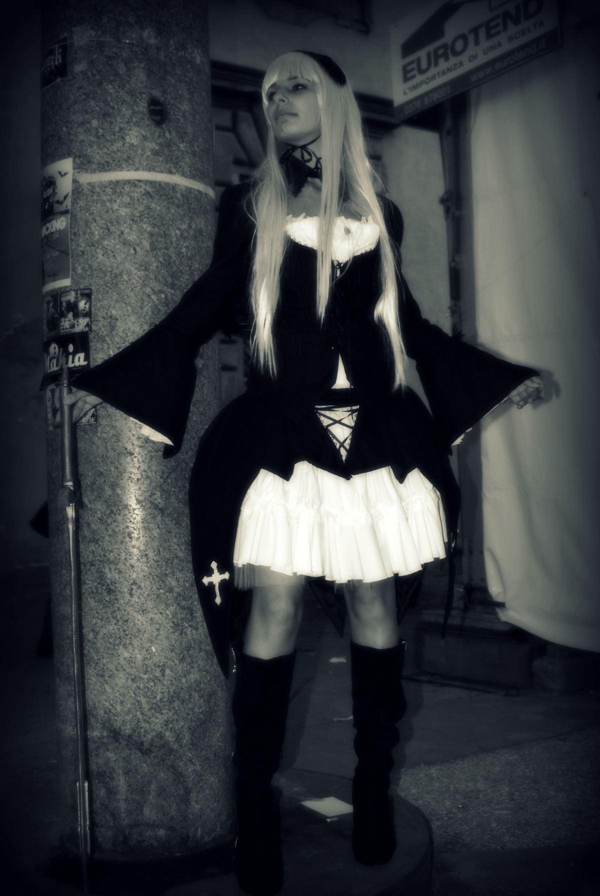 1girl boots dress knee_boots long_hair monochrome photo skirt solo standing suigintou