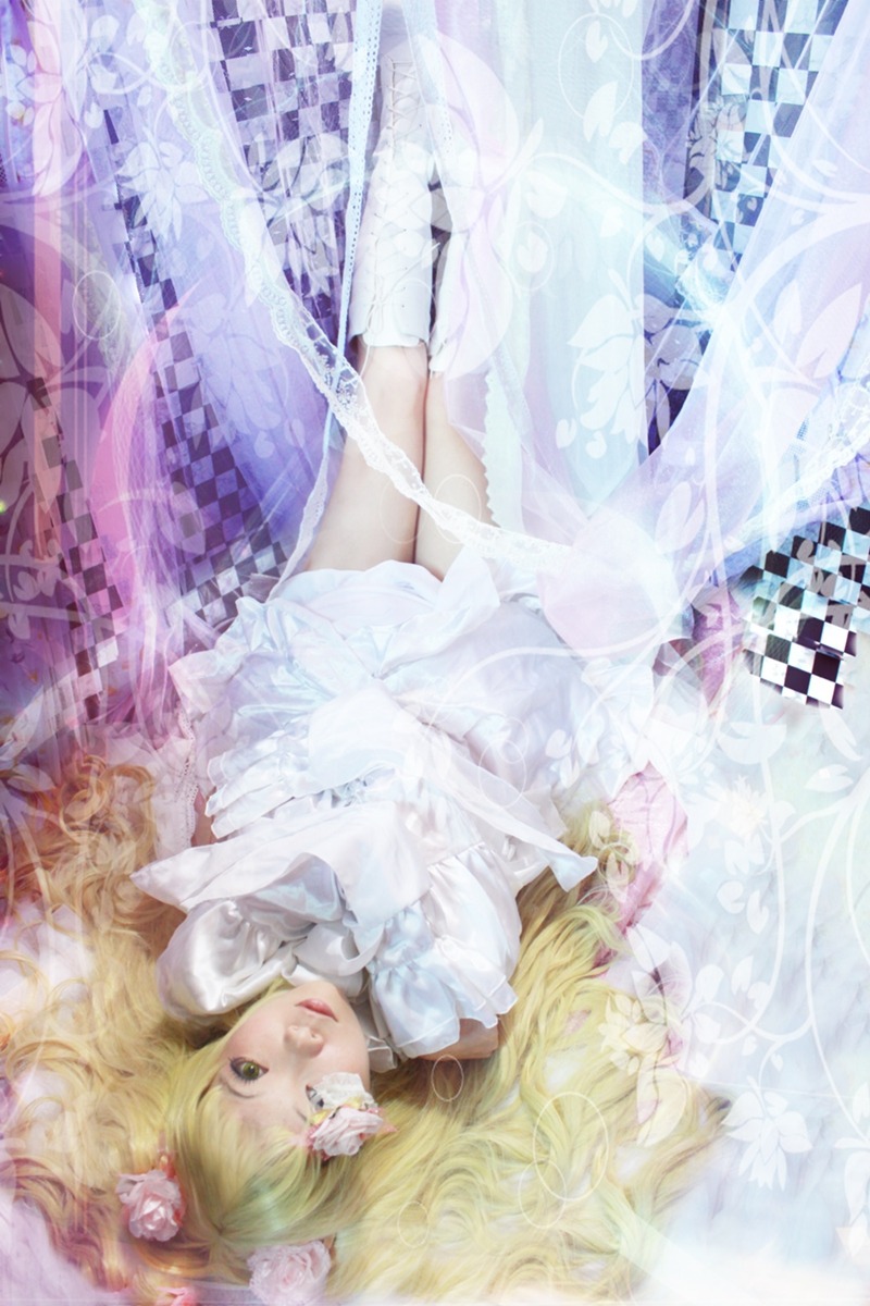 1girl argyle argyle_background argyle_legwear blonde_hair checkered checkered_background checkered_floor dress flower hair_flower hair_ornament kirakishou lips long_hair lying on_back solo white_dress