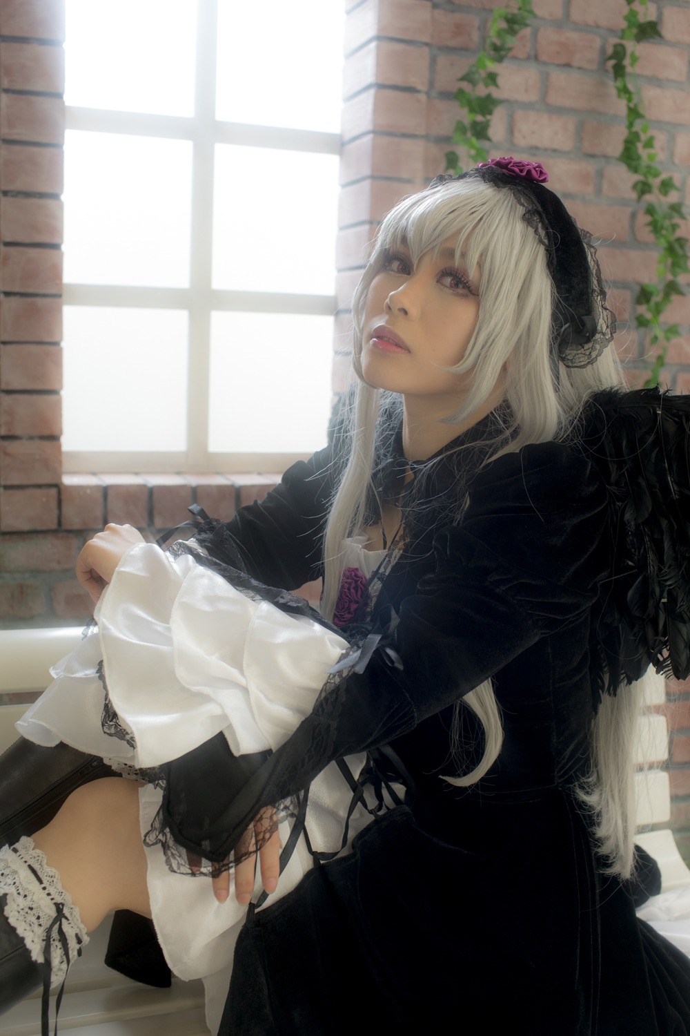 1girl dress flower frills gothic_lolita hairband indoors lace lips lolita_fashion long_hair long_sleeves realistic rose sitting solo suigintou window