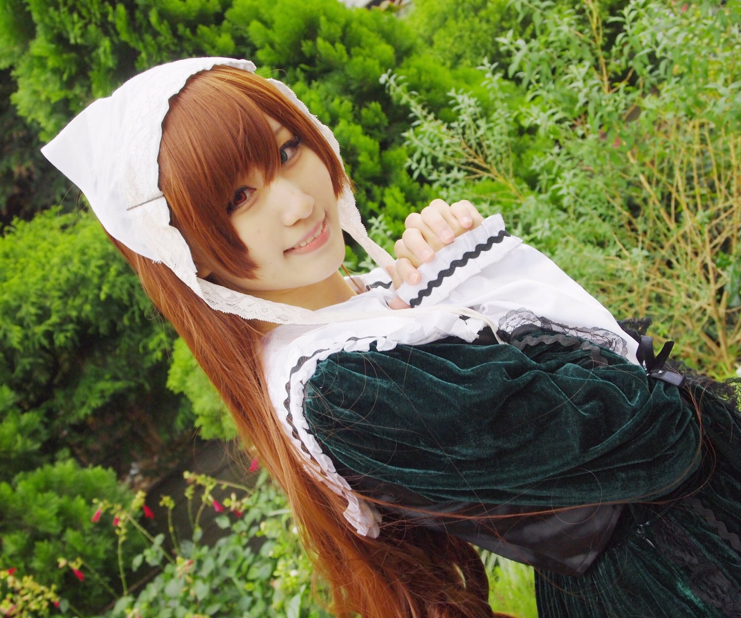 1girl brown_hair bush day dress forest head_scarf heterochromia long_hair long_sleeves looking_at_viewer nature outdoors smile solo suiseiseki tree