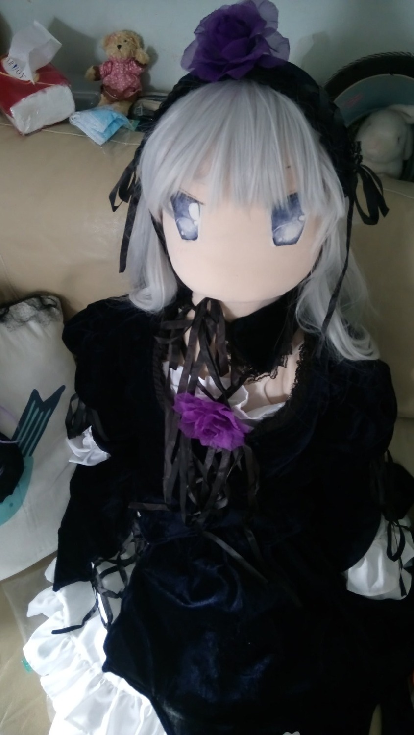 1girl black_dress doll dress flower gothic_lolita hairband lolita_fashion long_hair photo purple_flower purple_rose rose solo suigintou