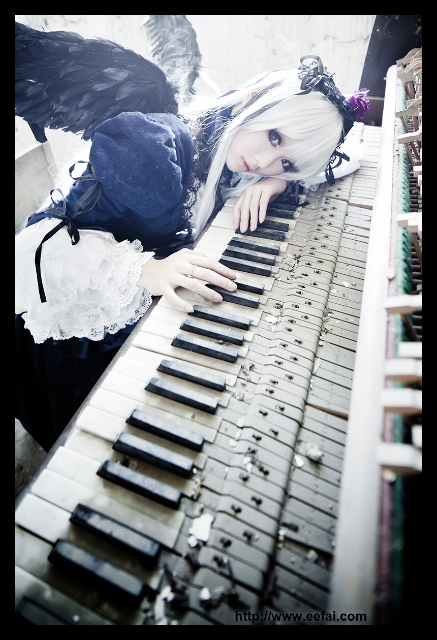 1girl blue_eyes blurry dress feathers frills instrument letterboxed lips long_sleeves nail_polish pillarboxed silver_hair solo suigintou wings