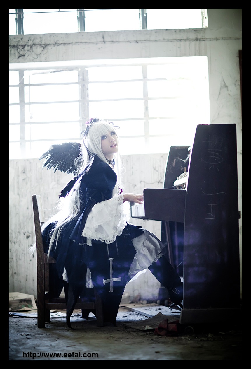 1girl apron black_wings dress feathers indoors letterboxed long_hair long_sleeves piano silver_hair sitting solo suigintou window wings