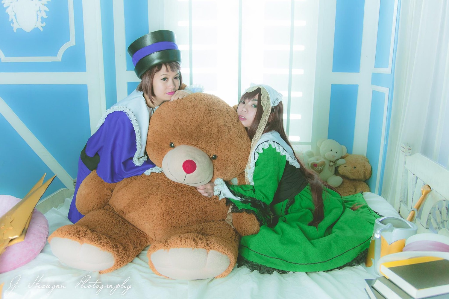 2girls blonde_hair brown_hair curtains dress green_eyes hat lipstick long_hair makeup multiple_cosplay multiple_girls sitting stuffed_animal tagme teddy_bear top_hat window