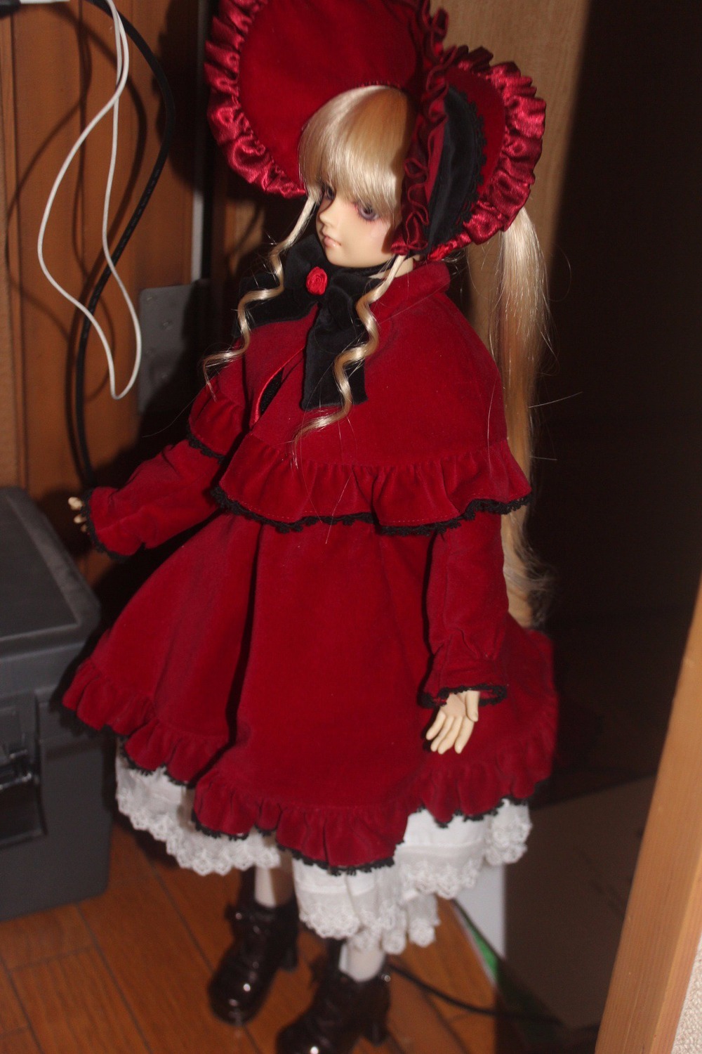 1girl blonde_hair blue_eyes bonnet boots bow doll dress frills long_hair long_sleeves looking_at_viewer photo red_dress shinku solo