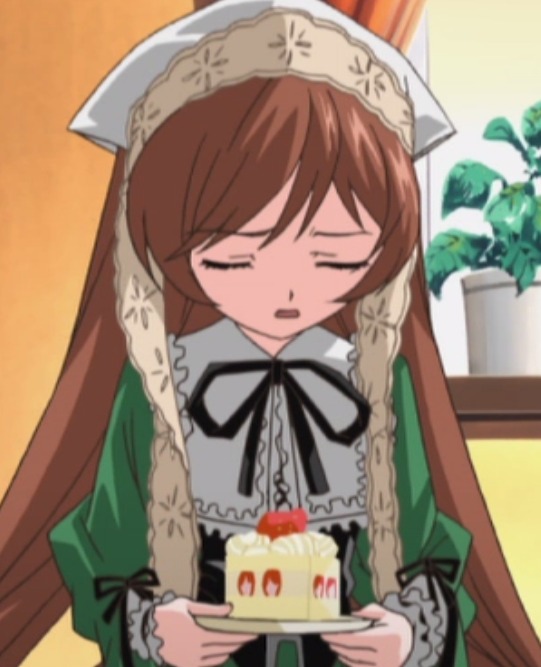 1girl bangs blurry blurry_background blurry_foreground brown_hair cake closed_eyes closed_mouth depth_of_field dress facing_viewer food frills fruit holding image long_hair long_sleeves motion_blur plate ribbon solo strawberry suiseiseki table very_long_hair