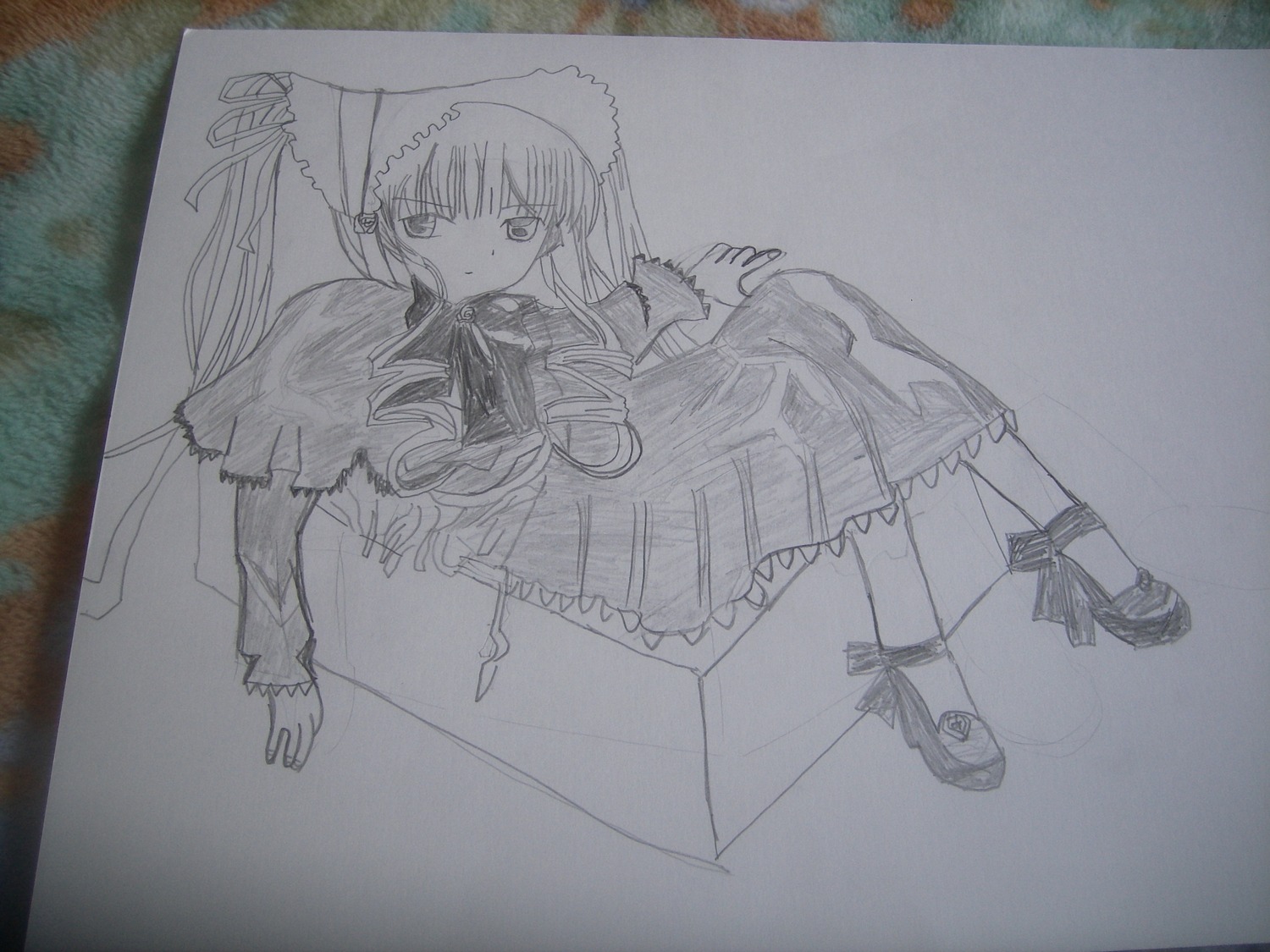 1girl bonnet bowtie dress frills full_body greyscale image in_box long_hair long_sleeves looking_at_viewer monochrome photo ribbon shinku shoes simple_background solo suigintou traditional_media very_long_hair white_background