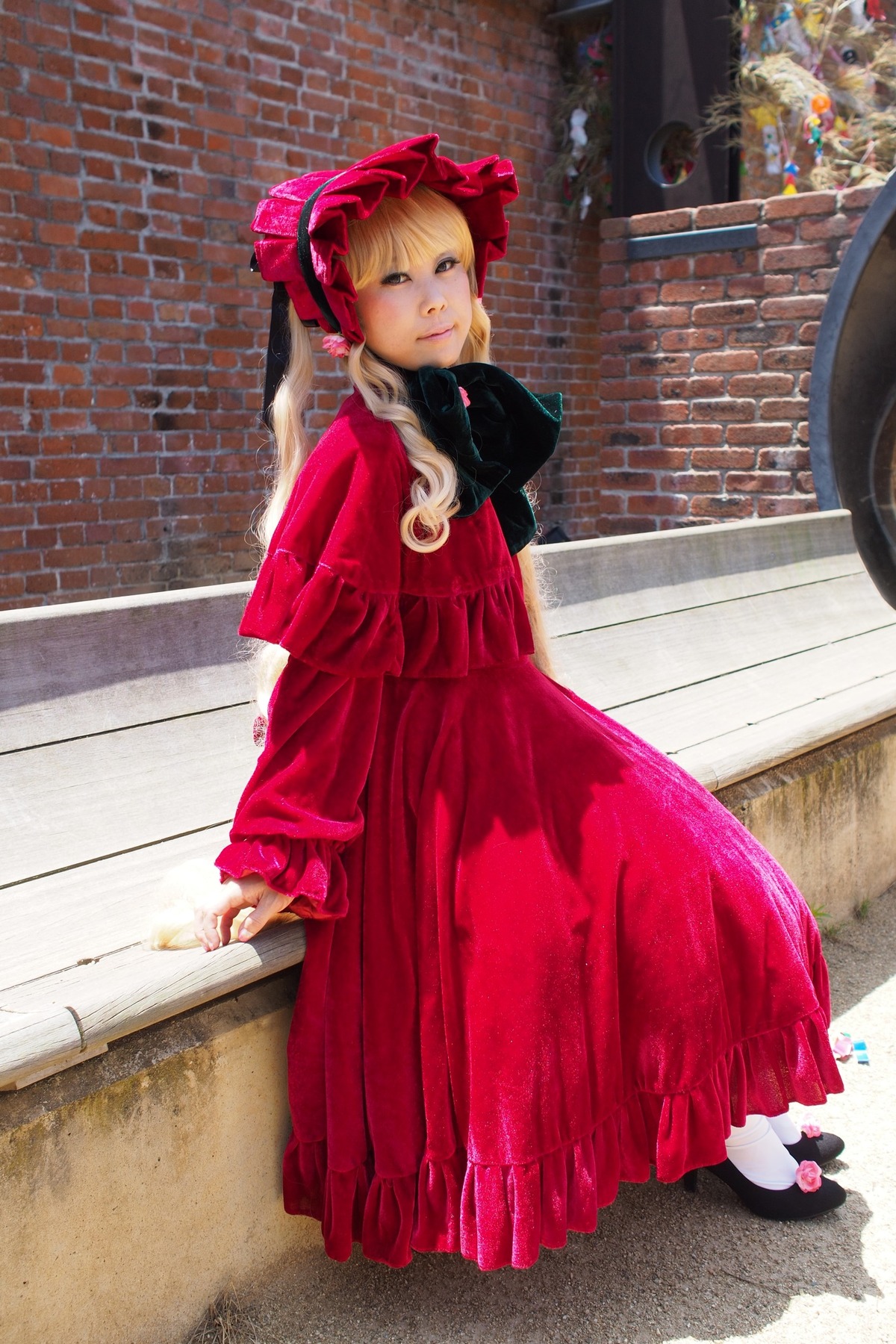 1girl blonde_hair bow dress full_body long_hair long_sleeves looking_at_viewer outdoors red_dress shinku shoes smile solo standing white_legwear