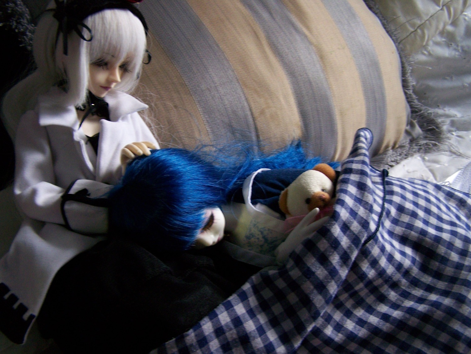 2girls blue_hair doll long_hair multiple_girls photo solo stuffed_animal suigintou white_hair