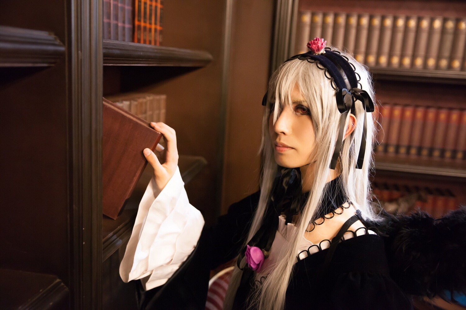 1girl book bookshelf flower hairband holding indoors library long_hair long_sleeves nail_polish rose silver_hair solo suigintou