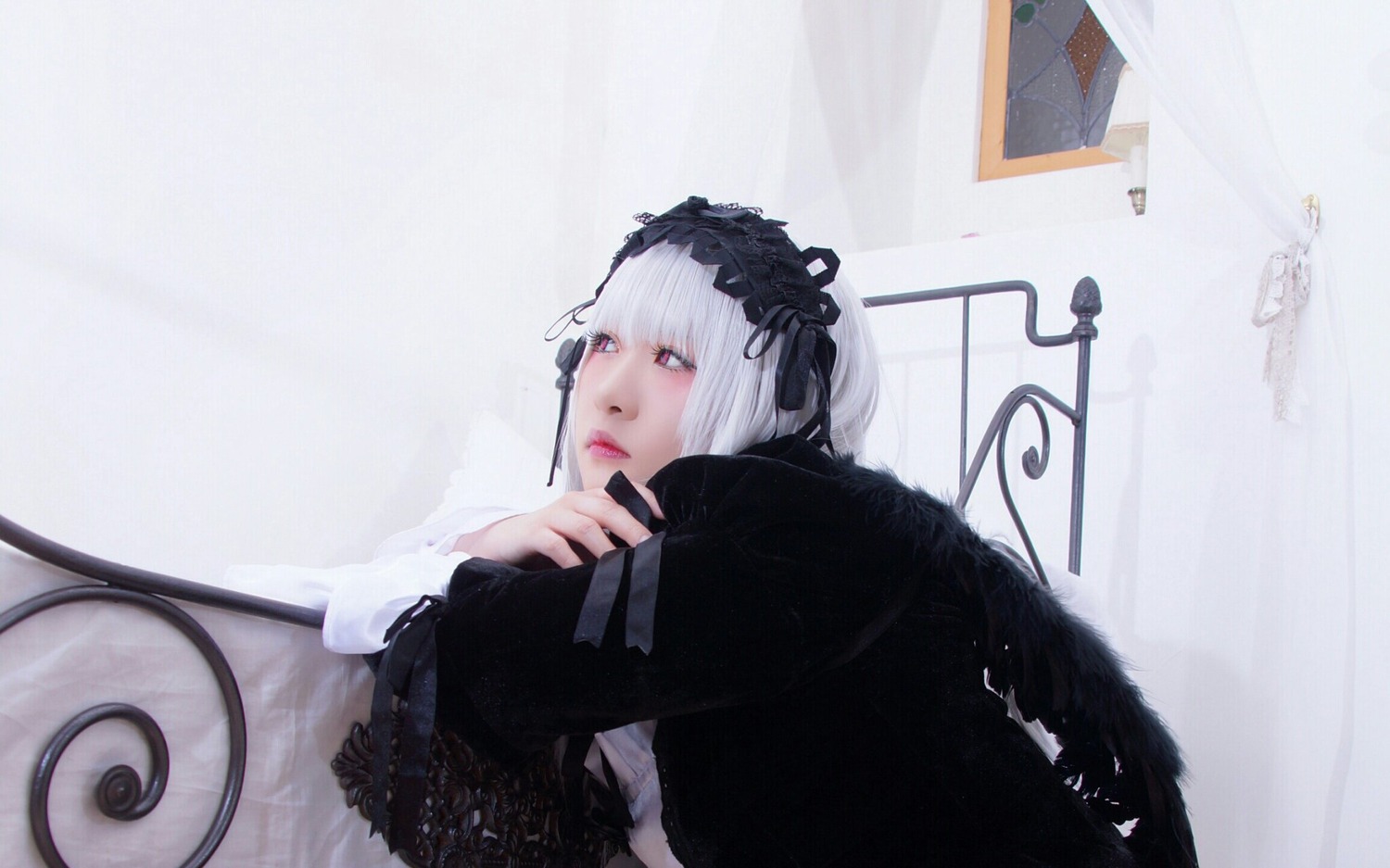 1girl bangs closed_mouth frills hairband lips long_sleeves looking_at_viewer red_eyes solo suigintou