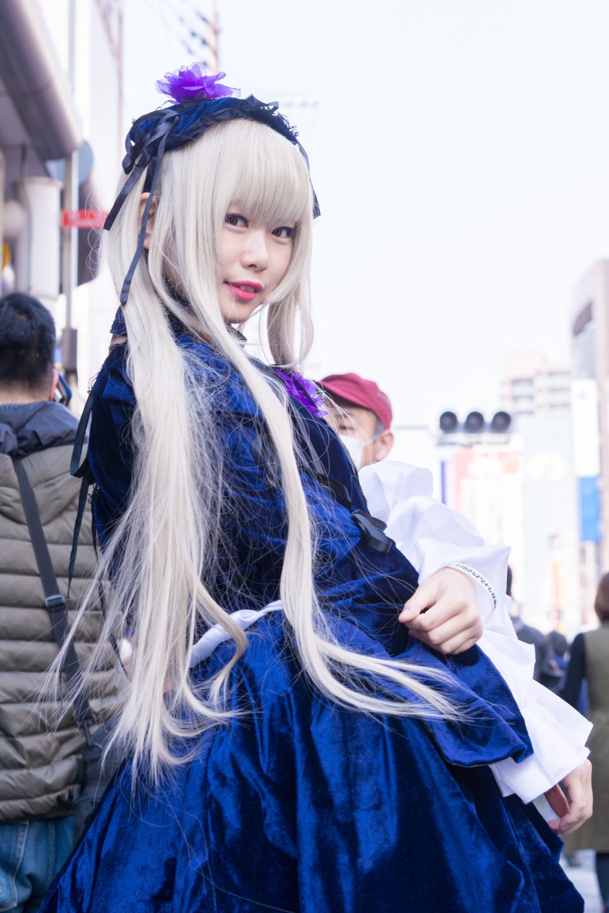 1girl blurry blurry_background depth_of_field dress flower hair_flower hair_ornament lips long_hair long_sleeves looking_at_viewer solo suigintou very_long_hair