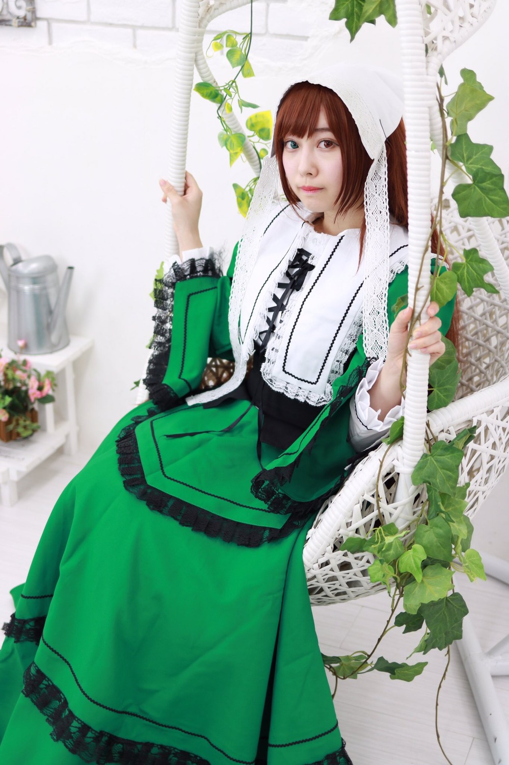 1girl 3d blurry brown_hair dress flower green_dress plant solo suiseiseki