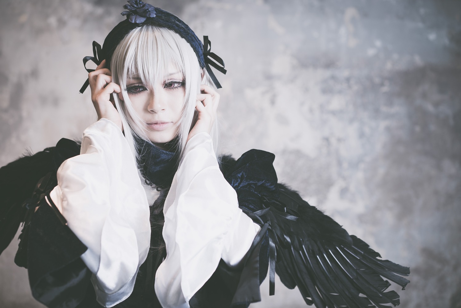 1girl bangs black_ribbon black_wings closed_mouth dress feathered_wings hairband lips long_sleeves looking_at_viewer ribbon solo suigintou upper_body wings