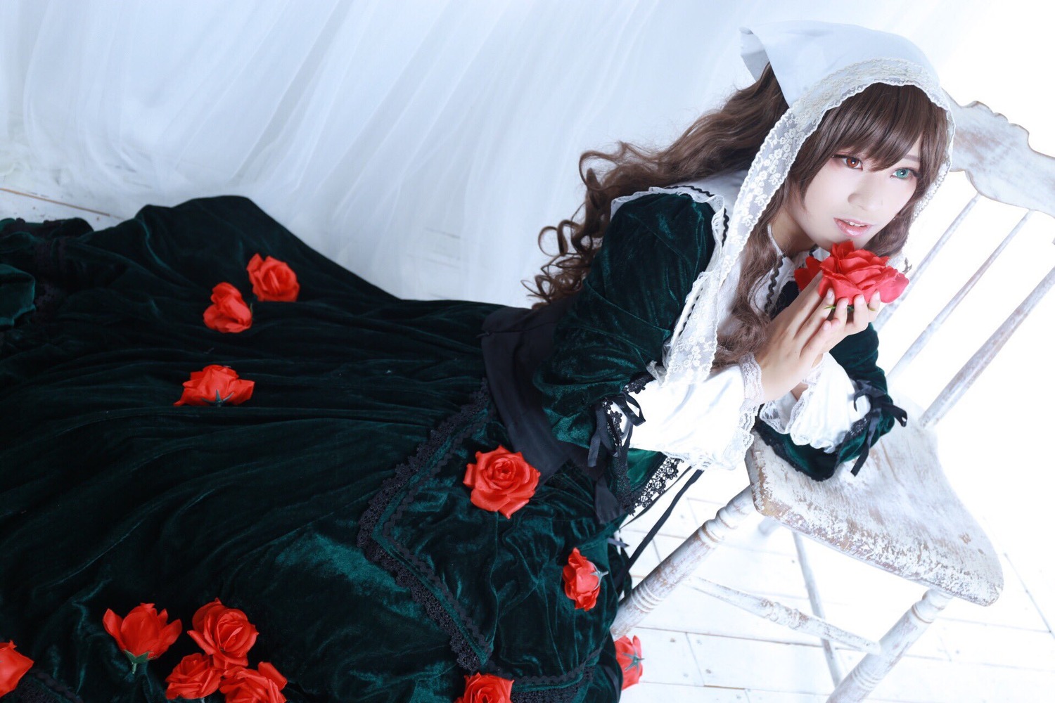 1girl black_dress blue_eyes brown_hair dress flower heterochromia hood lips long_hair long_sleeves red_flower red_rose rose solo suiseiseki veil