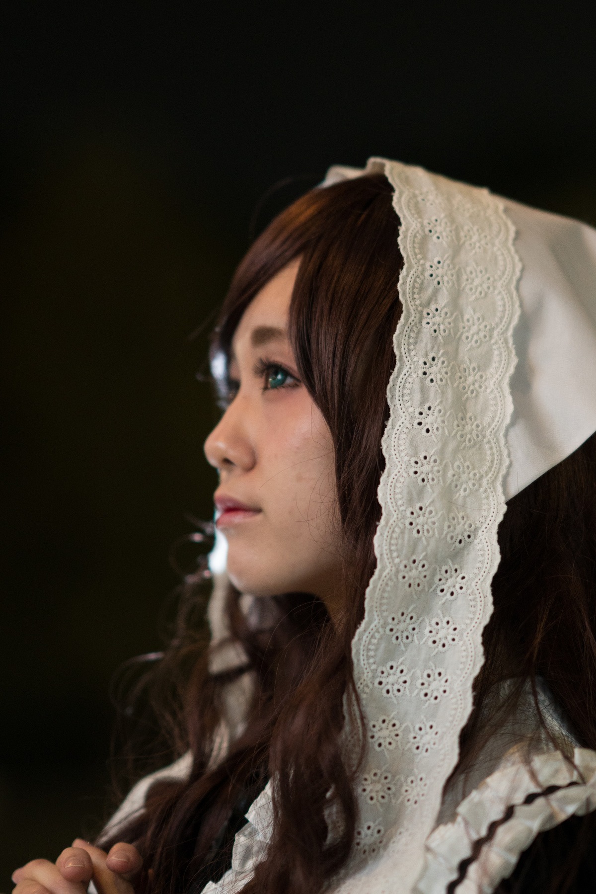 1girl brown_hair closed_mouth eyelashes from_side lips long_hair nose portrait profile realistic simple_background solo suiseiseki