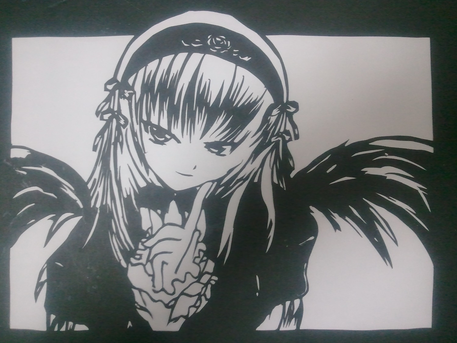 1girl black_wings feathered_wings flower frills greyscale hairband image index_finger_raised long_hair long_sleeves looking_at_viewer monochrome photo ribbon shikishi simple_background smile solo suigintou traditional_media upper_body wings