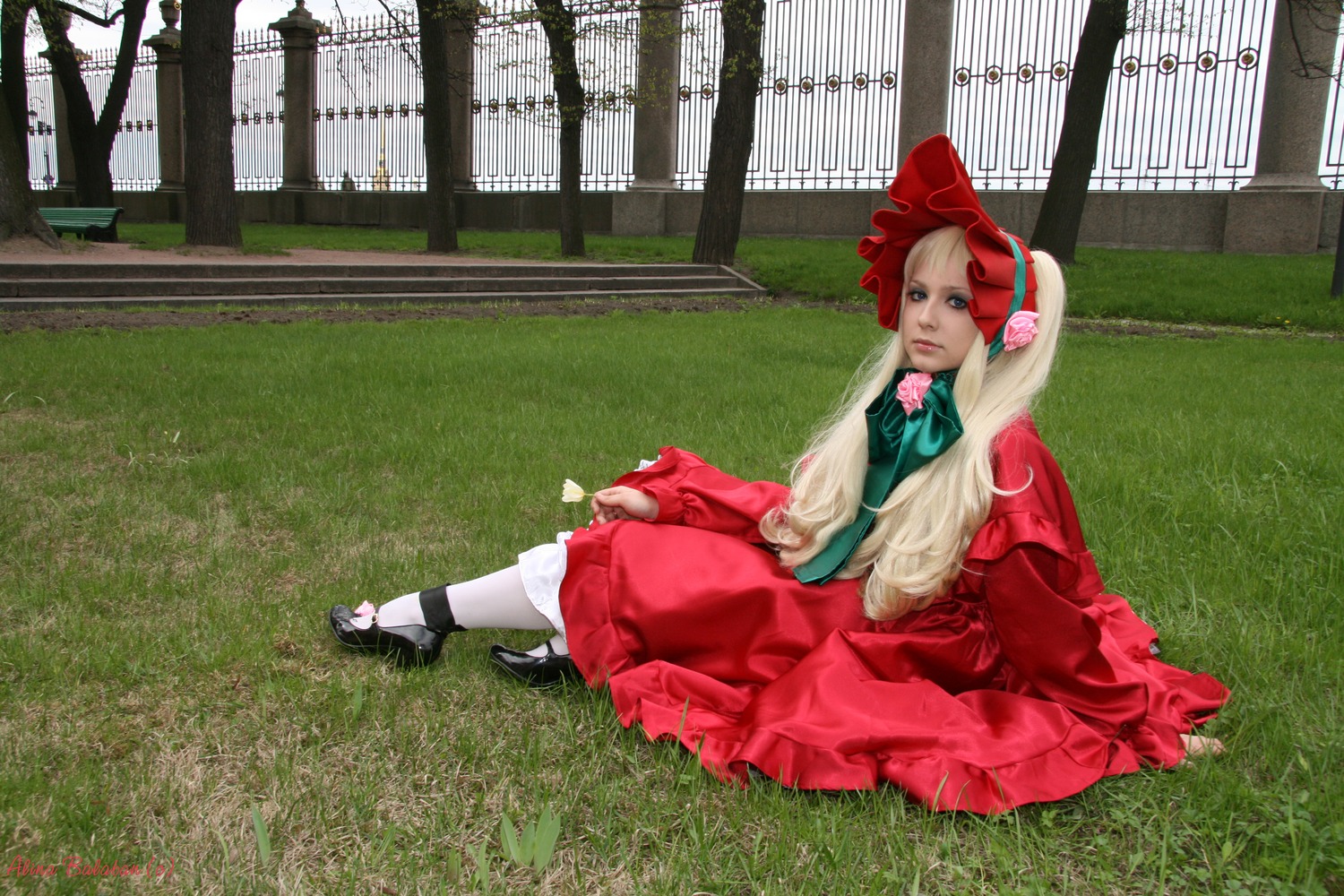 1girl blonde_hair blue_eyes bonnet bow doll_joints dress flower grass long_hair pantyhose red_dress shinku shoes sitting solo white_legwear