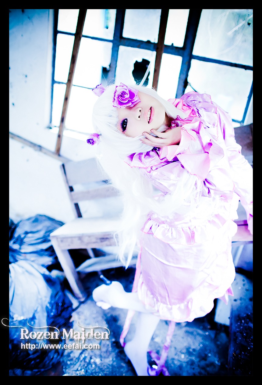 1girl barasuishou black_border blunt_bangs blurry border depth_of_field dress flower hair_ornament indoors letterboxed looking_at_viewer pillarboxed purple_eyes sitting solo white_hair window