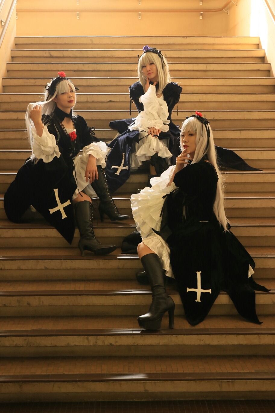 3girls black_dress blonde_hair boots closed_eyes dress long_hair multiple_girls sitting solo standing suigintou wings