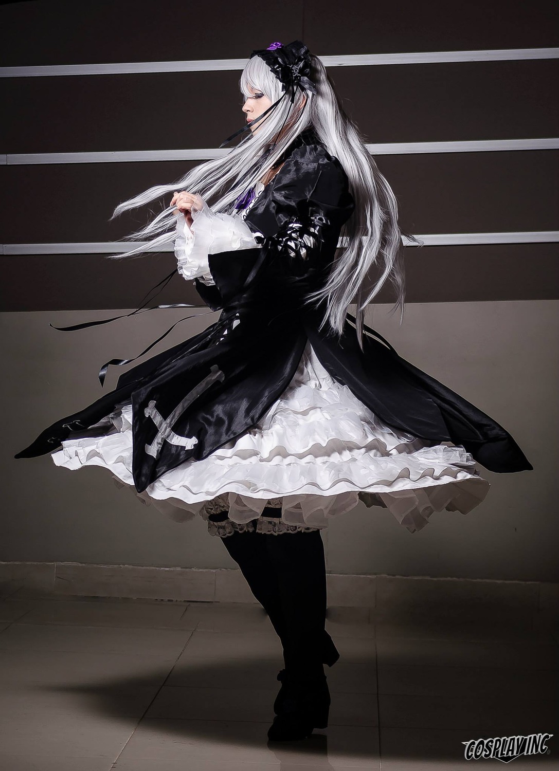 1girl black_dress black_footwear boots dress frills full_body gothic_lolita hairband high_heel_boots lolita_fashion long_hair long_sleeves profile solo standing suigintou very_long_hair wide_sleeves