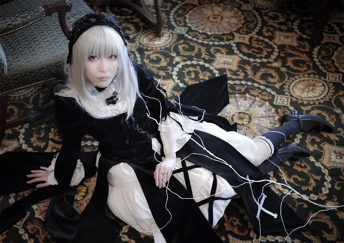 1girl black_dress dress frills lace long_sleeves looking_at_viewer pale_skin red_eyes sitting solo suigintou white_hair