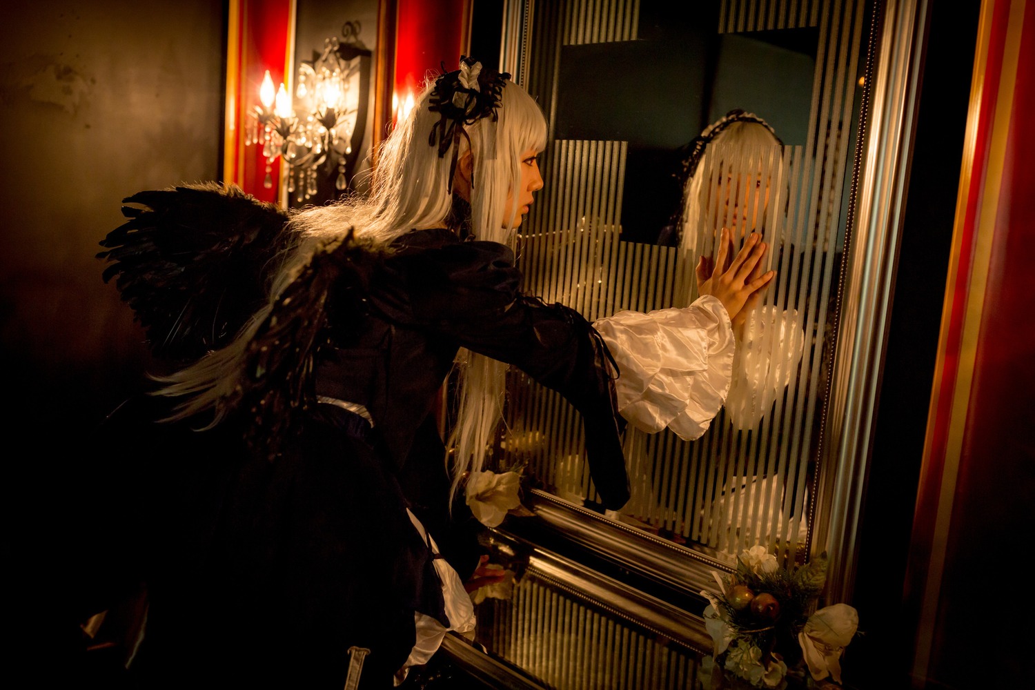 1girl bangs bird black_dress black_wings blonde_hair candle dress feathered_wings feathers indoors long_hair long_sleeves profile solo suigintou very_long_hair wide_sleeves wings