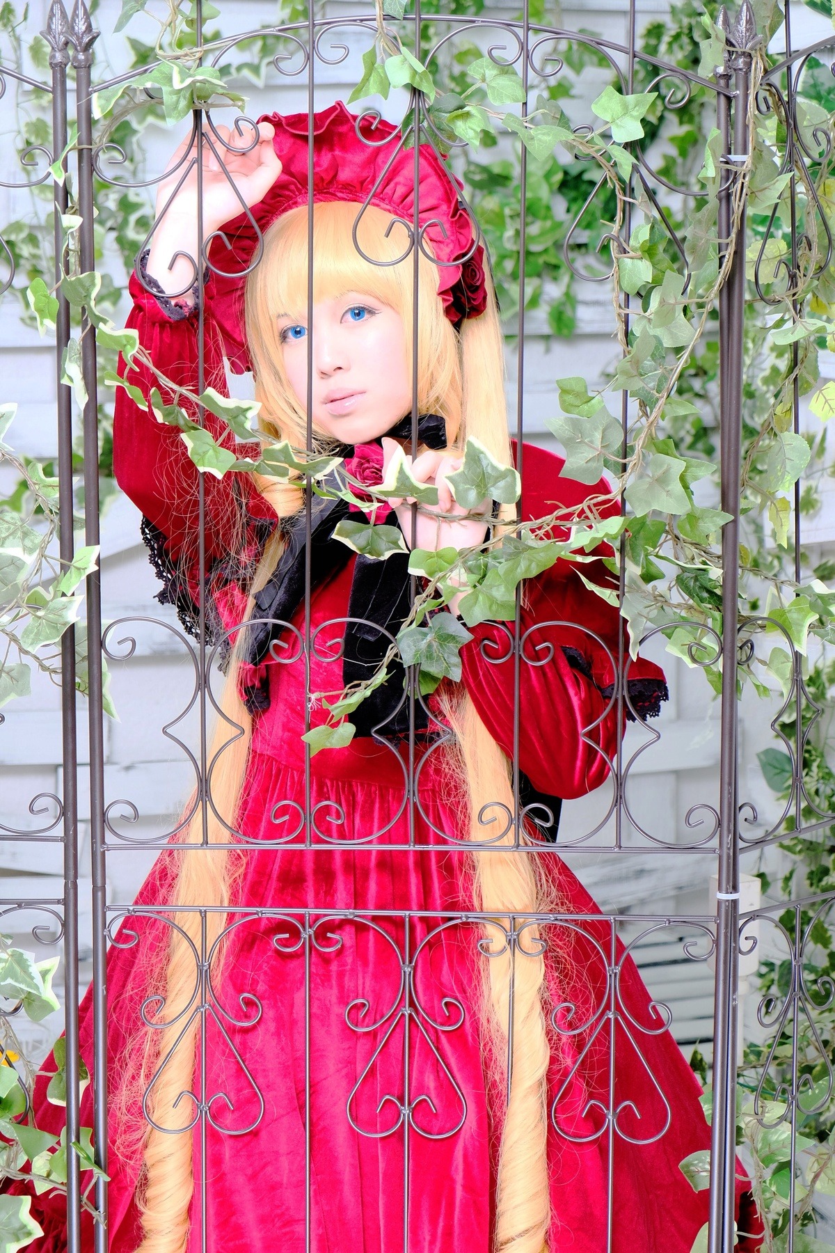 1girl blonde_hair blue_eyes dress flower plant red_dress rose shinku solo thorns vines