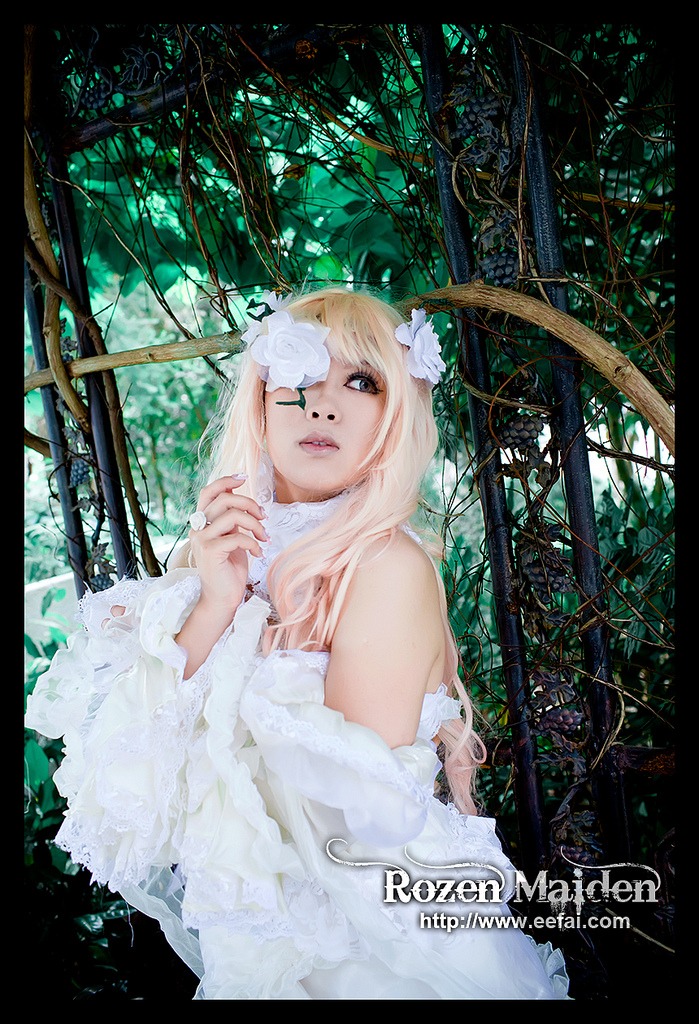 1girl blonde_hair dress eyepatch flower hair_flower hair_ornament kirakishou letterboxed lips nail_polish one_eye_covered plant solo veil vines wedding_dress white_dress white_flower