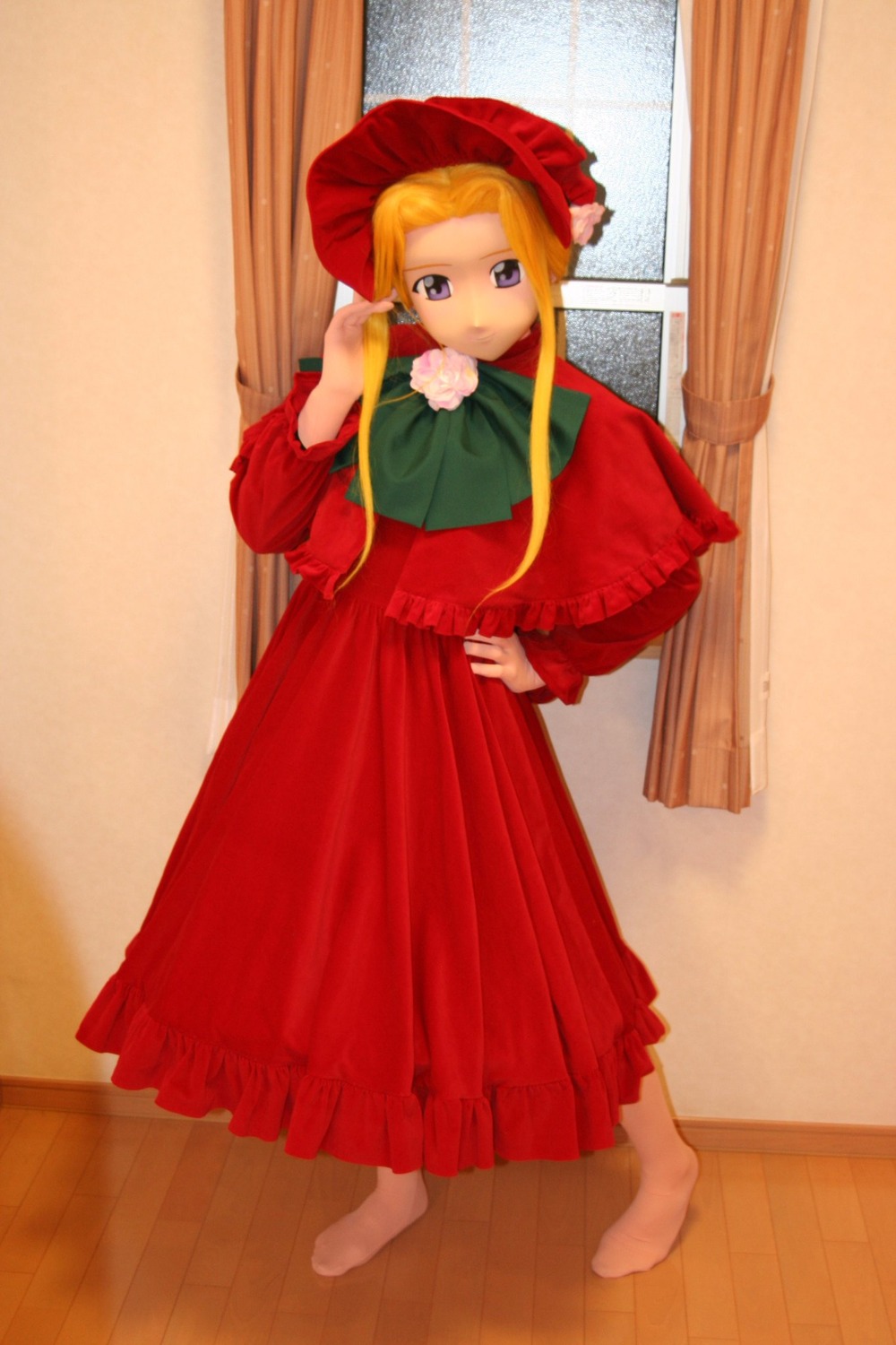 1girl blonde_hair blue_eyes bonnet capelet curtains dress full_body hat indoors long_hair long_sleeves looking_at_viewer red_dress shinku solo standing