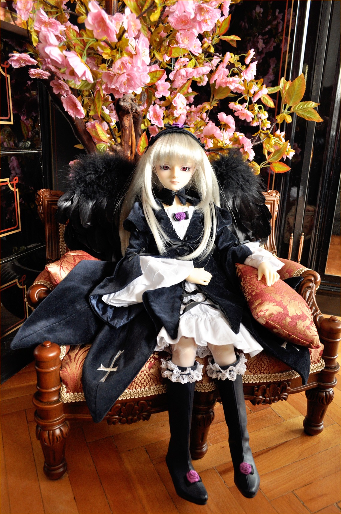 1girl black_legwear doll dress flower frills gothic_lolita hairband lolita_fashion long_hair sitting solo standing suigintou thighhighs