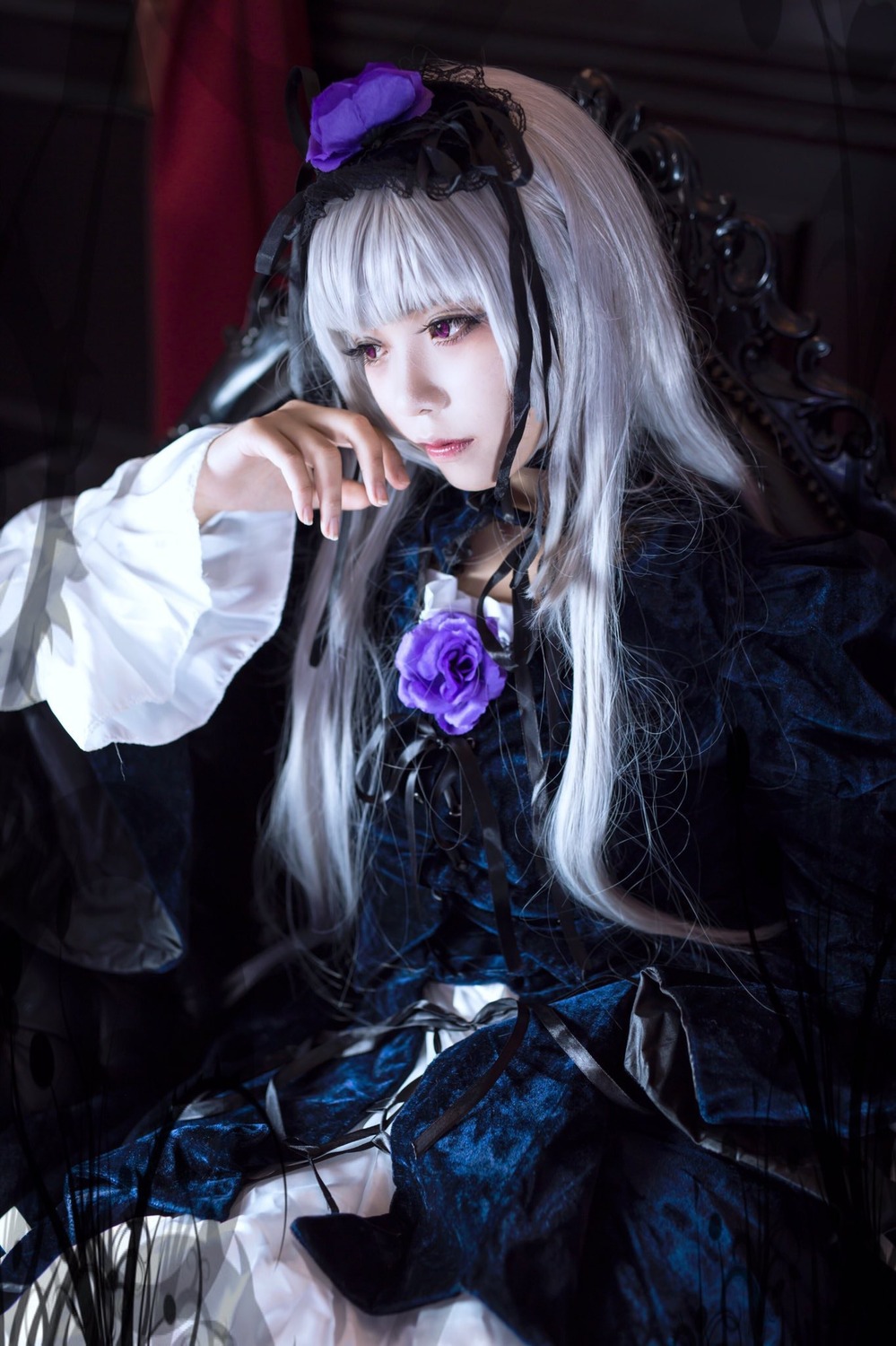 1girl bangs dress flower frills gothic_lolita lips lolita_fashion long_hair long_sleeves sitting solo suigintou white_hair