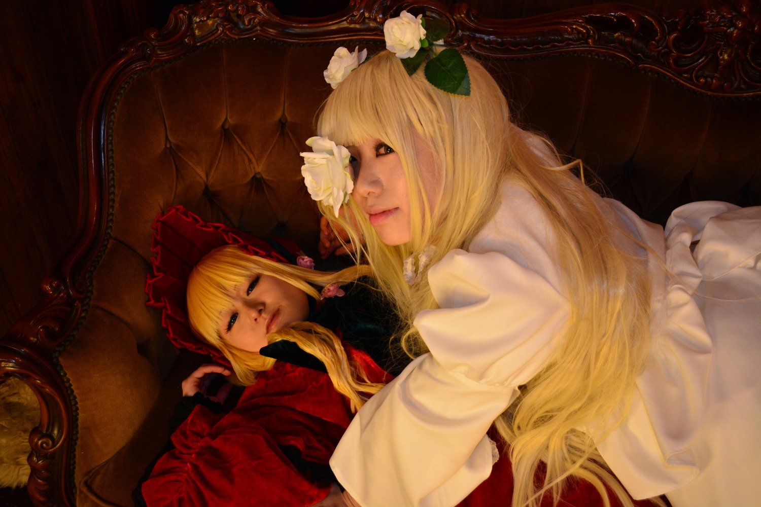 2girls blonde_hair closed_eyes dress dual_persona flower lips long_hair long_sleeves multiple_cosplay multiple_girls realistic rose shinku siblings sitting sleeping tagme