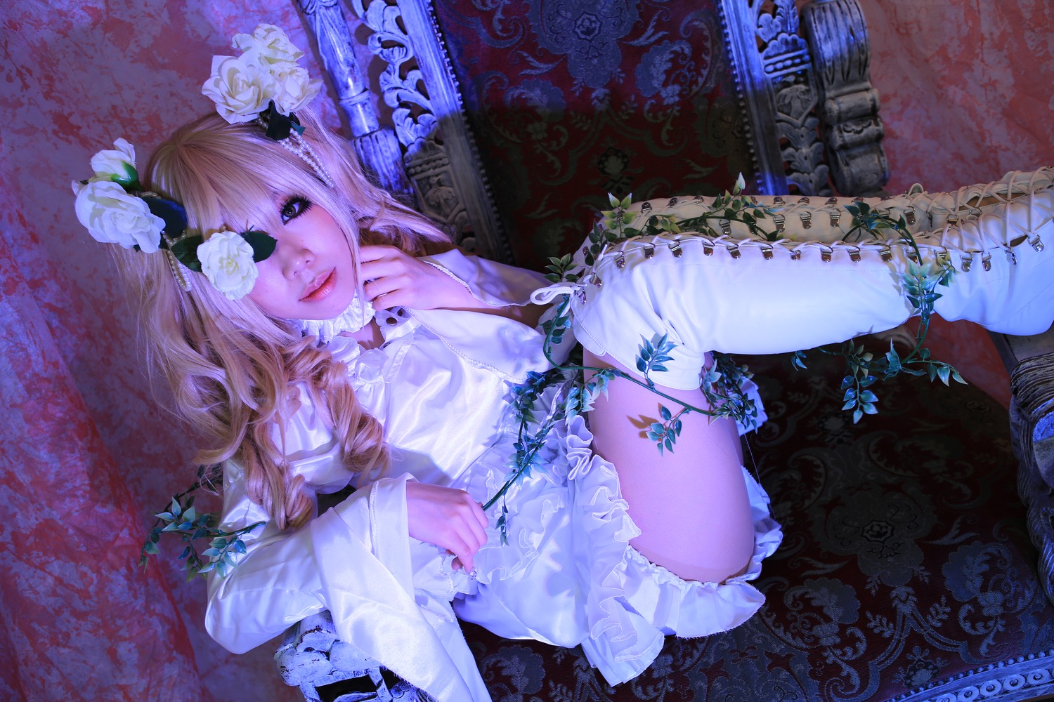 1girl blonde_hair dress eyepatch flower hair_flower hair_ornament kirakishou lace lips lolita_fashion long_hair rose sitting solo thighhighs white_flower